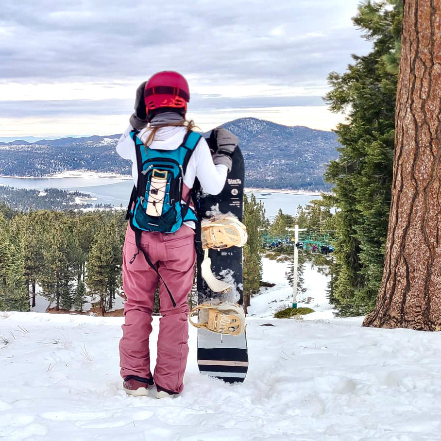 Mila's Keeper Insulated Breast Milk Cooler with mom on snowboard